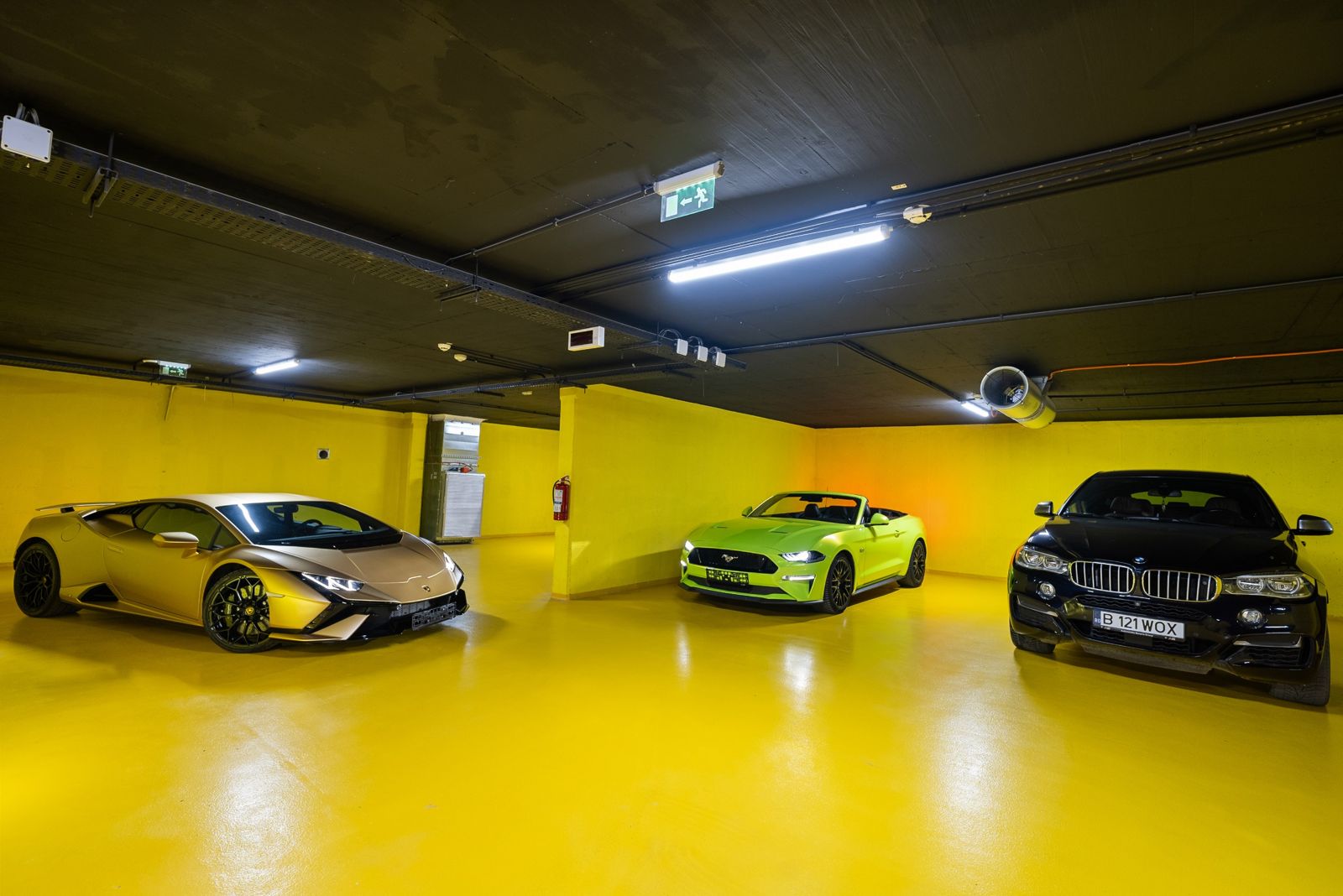 A car collection inside the 360 m² private garage of the Cloud 9 penthouse, Pipera